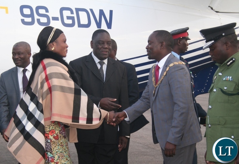 -North-Western province permanent secretary Ephraim Mateyo (m) introduces Congolese Lualaba province vice governor Fin Saini (l) to Solwezi mayor Nicholas Mukumbi at Solwezi airport as provincial police commissioner Hudson Namachila looks on upon arrival in Solwezi on Wednesday. PICTURE BY BETRAM KAOMA (ZANIS)