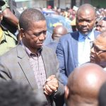 President Edgar Lungu talks to COMESA Secretary General Songiso Ngwenya during the tour of gutted COMESA market
