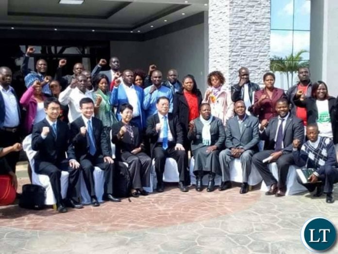 FILE: Officials from the Chinese Communist Party at the PF Secretariat