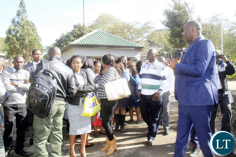 Mr Lusambo addressing the civil servants who came late for work shortly before chasing them away.