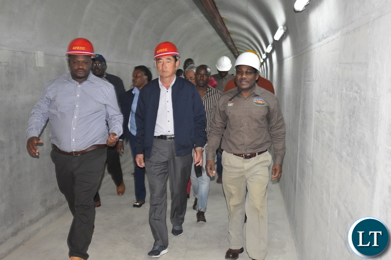Minister of National Development Planning Hon. Alexander Chiteme (left), AFECC Contract Manager Jia Tao Kan and Ministry of Agriculture’s Irrigation Development Support Project (IDSP) national project coordinator Dr Barnabas Mulenga inspecting the Mwomboshi Dam in Chibombo District on Thursday 2 August 2018. Photo | Chibaula D. Silwamba | MNDP