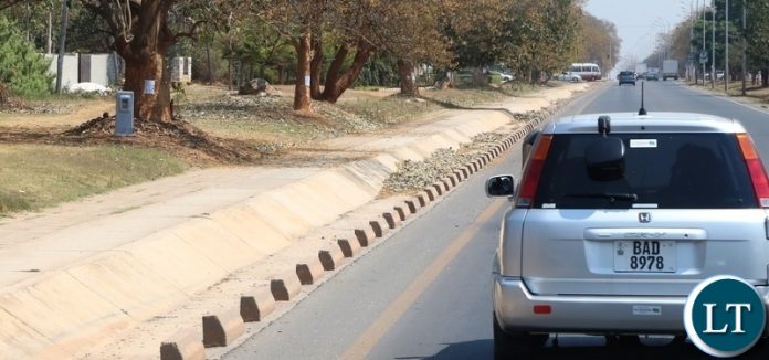 Installation of Speed Limit Cameras has brought sanity on same Lusaka roads. Here a motorist take precaution measure as they drive along great East road where Road Transport and Safety Agency (RTSA) has installed the cameras as a camera is seen on far left under the tree Installation of Speed Limit Cameras has brought sanity on same Lusaka roads. Here a motorist take precaution measure as they drive along great East road where Road Transport and Safety Agency (RTSA) has installed the cameras as a camera is seen on far left under the tree
