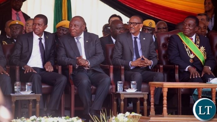 (SADC of States) President Edgar Lungu, South African President Cyril Ramaposa, AU Chairperson who is also President of Rwanda Paul Kagami and President Emmerson Mnangagwa follow proceeding during inauguration ceremony (SADC of States) President Edgar Lungu, South African President Cyril Ramaposa, AU Chairperson who is also President of Rwanda Paul Kagami and President Emmerson Mnangagwa follow proceeding during inauguration ceremony