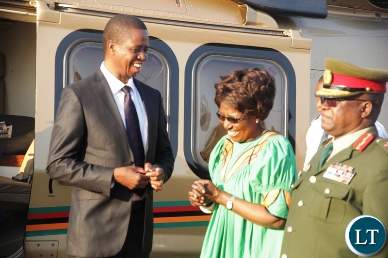 President Edgar Lungu talking to Vice President Inonge Wina before departure for Zimbabwe at Kenneth Kaunda International Airport
