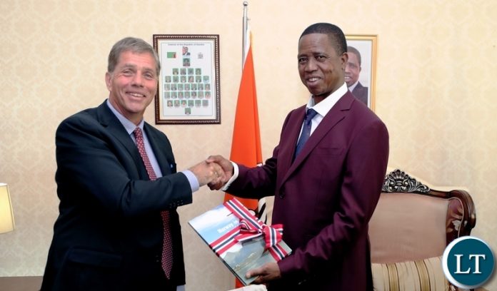 President Edgar Chagwa Lungu (right) receives a book on Norway’s development activities in Zambia from Norwegian Ambassador to Zambia Kikkan Haugen when he paid a farewell courtesy call on the President at State House on Wednesday, August 1,2018 . PICTURE BY EDDIE MWANZALEZA/STATE HOUSE ©2018