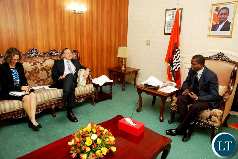 President Edgar Chagwa Lungu (right) talks to American Ambassador to Zambia Daniel Foote (centre) during a meeting at State House on Thursday, August 23, 2018. The President and Mr Foote discussed several issues on bilateral relations between Zambia and the United States of America. PICTURE BY SALIM HENRY/STATE HOUSE ©2018
