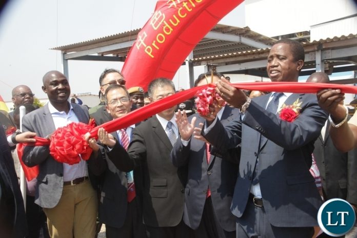 President Edgar Lungu cutting the ribbon to officially commission the NFCA mining project in Chambishi President Edgar Lungu cutting the ribbon to officially commission the NFCA mining project in Chambishi