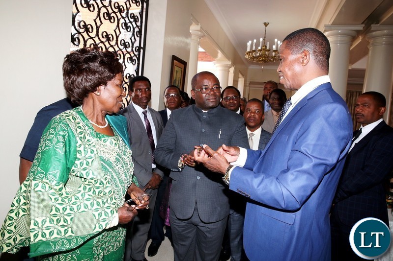 President Edgar Chagwa Lungu (R) talks to Minister of Housing and Infrastructure Development Ronald Chitolela as Vice-President Inonge Wina (left) and Cabinet Ministers look on at tea break during a Cabinet meeting at State House on Monday, August 13,2018-Picture by THOMAS NSAMA
