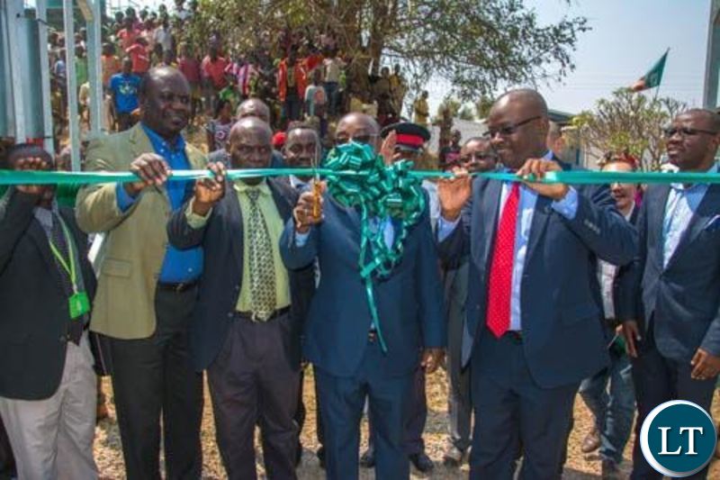 Transport and Communications Minister Brian Mushimba and ZAMTEL CEO Sydney Mupeta cutting the ribbon during the launch of a new communication tower at Kalilo in Chingola rural