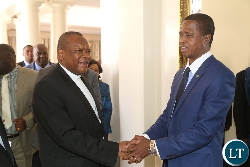 President Edgar Lungu shake hands with Vice Chair of the Conference of Catholic Bishops of Democratic Republic of Congo Bishop Fridolin Ambongo shortly meeting the President at State House