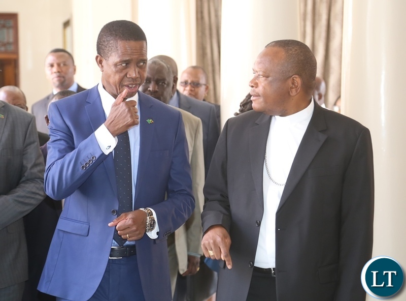 President Edgar Lungu confers with Vice Chair of the Conference of Catholic Bishops of Democratic Republic of Congo Bishop Fridolin Ambongo shortly meeting the President at State House