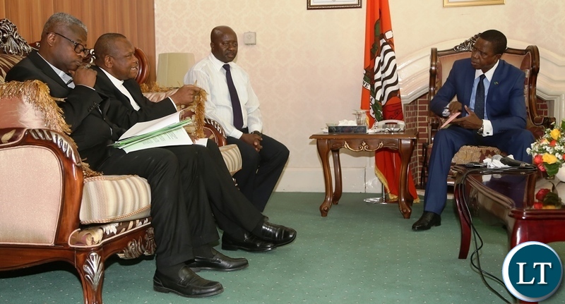 Vice Chair of the Conference of Catholic Bishops of Democratic Republic of Congo Bishop Fridolin Ambongo flanked by Secretary General of the Conference of Catholic Bishops of Democratic Republic of Congo Bishop Donatien Nshole confers with President Edgar Lungu at State House