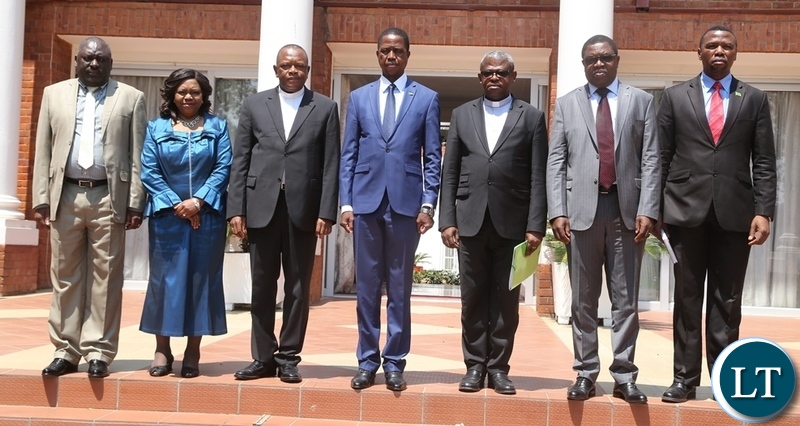 President Edgar Lungu, Vice Chair of the Conference of Catholic Bishops of Democratic Republic of Congo Bishop Fridolin Ambongo (third from left) Secretary General of the Conference of Catholic Bishops of Democratic Republic of Congo Bishop Donatien Nshole (third from right) Minister of Defence Davies Chama (l) Minister of Religious Affairs Godfridah Sumaili (2nl) Minister of foriegn Affairs Joseph Malanji (2nr) and Zambian ambassador to Democratic Republic of Congo Friday Nyambe pose for the Photo at State House