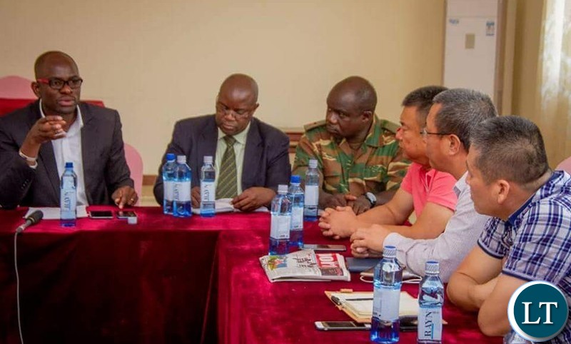 Kitwe District Commissioner Binwell Mpundu meeting with Chinese Nationals