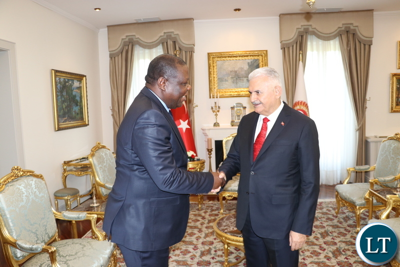 Zambia’s Ambassador to the Republic of Turkey, Dr Joseph Chilengi presents a gift to Speaker of the Grand National Assembly of the Republic of Turkey, Binali Yildirim in Ankara