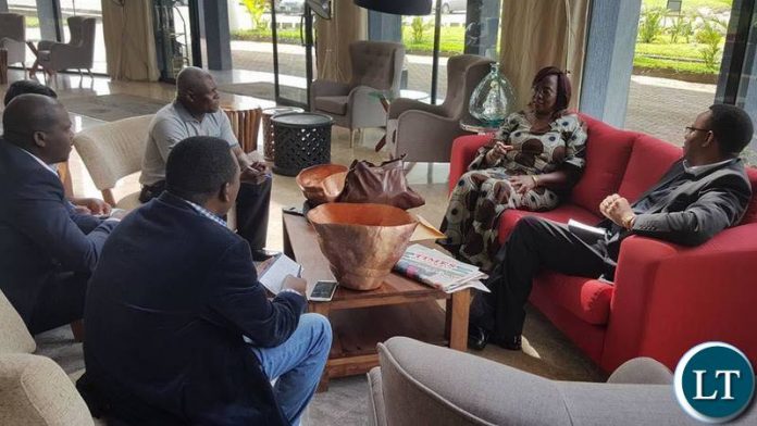 Mr. McPherson M Chanda, Postmaster General discussing social cash with Ms. Kabanshi-January 2017