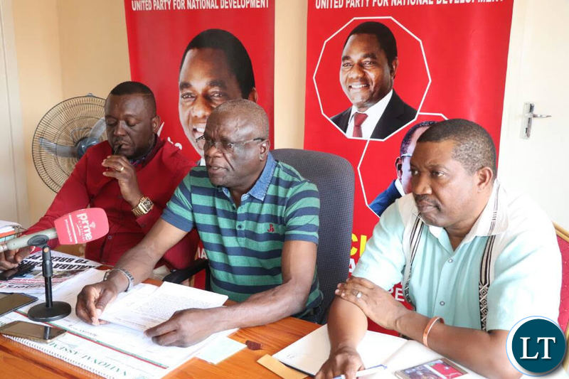 UPND Secretary General Stephen Katuka addressing a media briefing today flanked by Mazabuka Central MP Garry Nkombo and Deputy National Secretary Patrick Mucheleka.