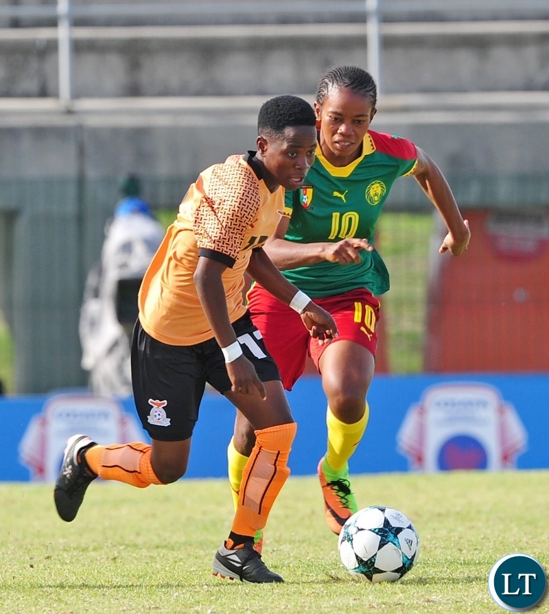 Mary Mwakapila of Zambia takes on Charlene Yverna Meyong Menene of Cameroon during the 2018 Cosafa Womens Championship game between Zambia and Cameroon at Wolfson Stadium in Port Elizabeth on 15 September 2018 © Ryan Wilkisky/BackpagePix