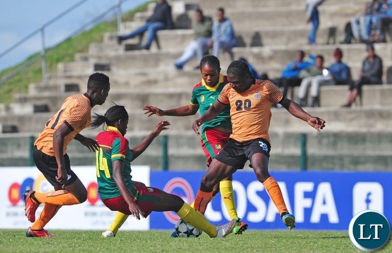 Rachel Nachula of Zambia is tackled by Abena Therese Ninon of Cameroon during the 2018 Cosafa Womens Championship game between Zambia and Cameroon at Wolfson Stadium in Port Elizabeth on 15 September 2018 © Ryan Wilkisky/BackpagePix