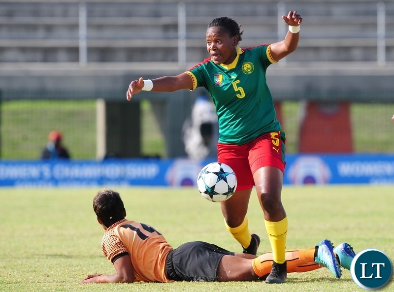 Hellen Chanda of Zambia is fouled by Ejangue Siliki Augustine Sylvia of Cameroon during the 2018 Cosafa Womens Championship game between Zambia and Cameroon at Wolfson Stadium in Port Elizabeth on 15 September 2018 © Ryan Wilkisky/BackpagePix