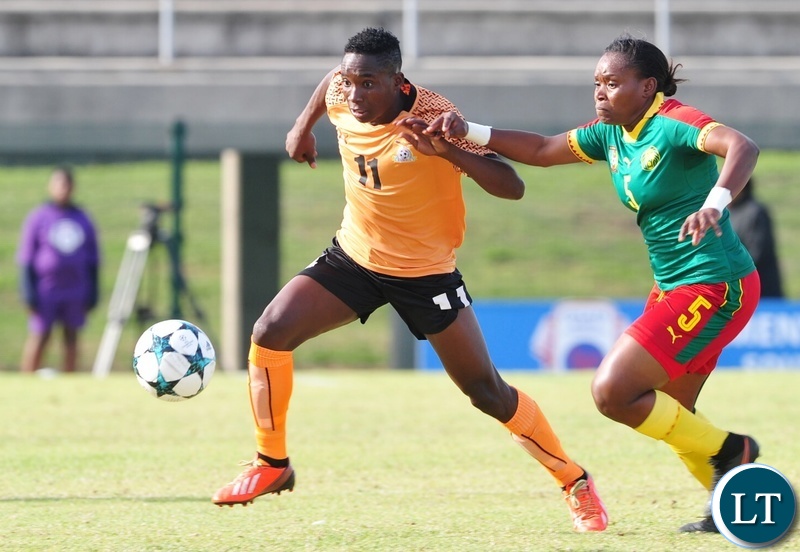 Barbra Banda of Zambia takes on Ejangue Siliki Augustine Sylvia of Cameroon during the 2018 Cosafa Womens Championship game between Zambia and Cameroon at Wolfson Stadium in Port Elizabeth on 15 September 2018 © Ryan Wilkisky/BackpagePix