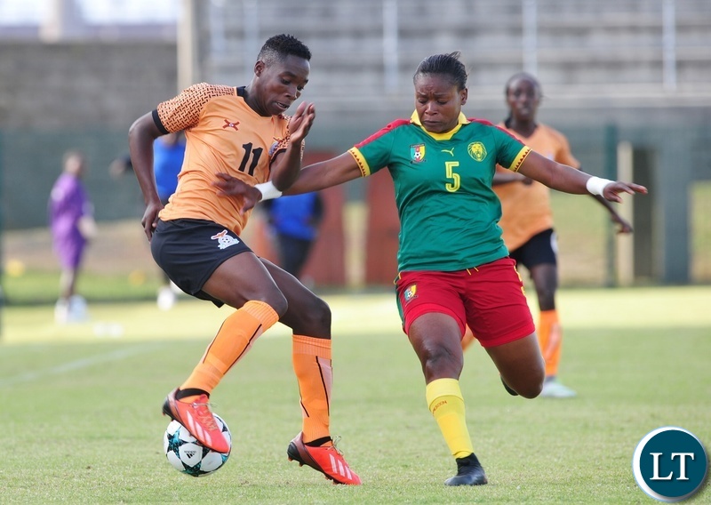 Barbra Banda of Zambia takes on Ejangue Siliki Augustine Sylvia of Cameroon during the 2018 Cosafa Womens Championship game between Zambia and Cameroon at Wolfson Stadium in Port Elizabeth on 15 September 2018 © Ryan Wilkisky/BackpagePix