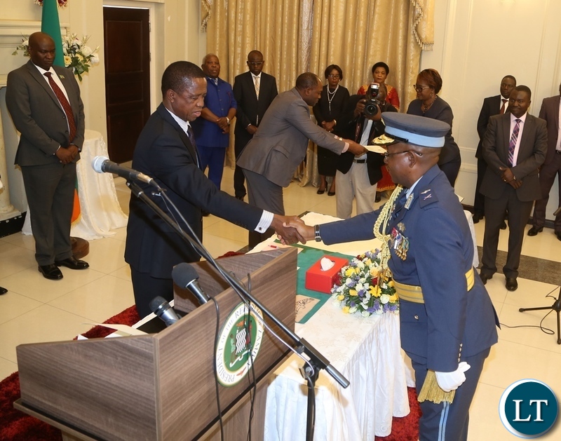 President Edgar Lungu congratulates the newly appointed Deputy Zambia Air Force Commander Major General Kapotwe Chintu shortly after presenting his latter of Oath to the President at State House