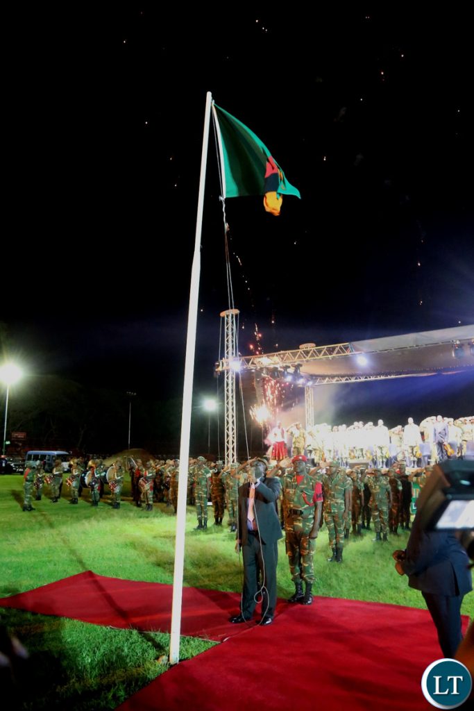 Minister of Defence Davies Chama Hoisting the Zambian Flag at Lusaka Show Grounds during the hoisting of the flag ceremony