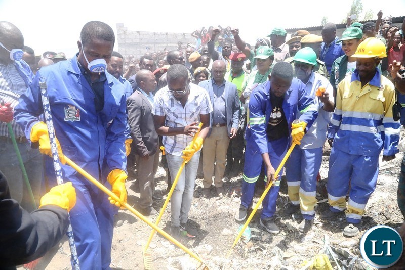 President Edgar Lungu joins in the cleaning exercise in Kafue