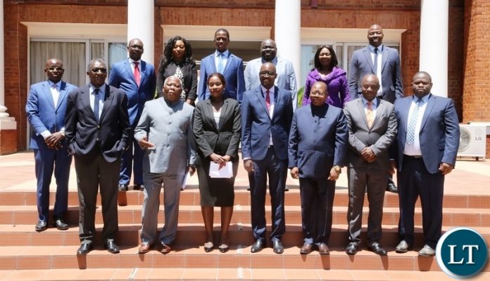 President Edgar Lungu take the official photo with Economics Association of Zambia Members shortly after the courtesy call at State House