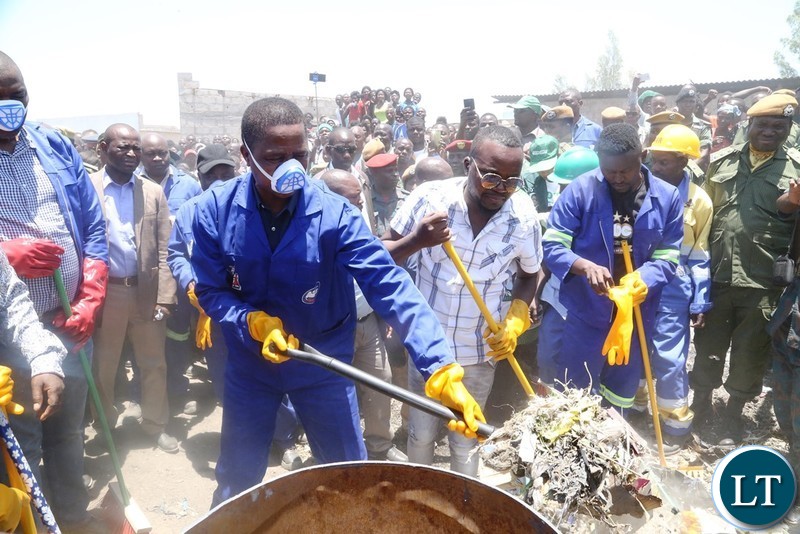 President Edgar Lungu joins in the cleaning exercise in Kafue