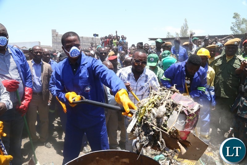 President Edgar Lungu joins in the cleaning exercise in Kafue