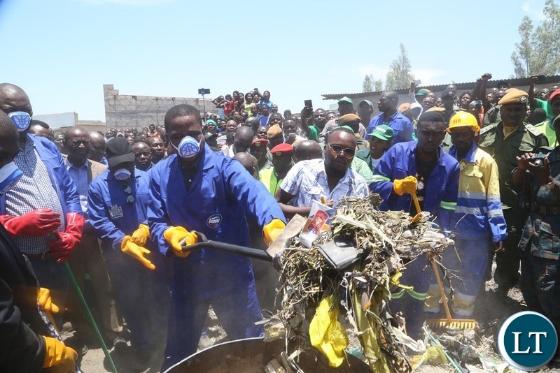 President Edgar Lungu joins in the cleaning exercise in Kafue