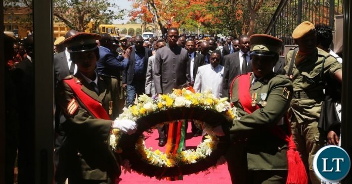 President Edgar Lungu laying wreath at Embassy part during the Memorial of the Late President Sata
