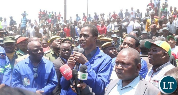President Edgar Lungu speaking to thousands of Kafue resident who welcomed him for the cleaning exercise in Kafue President Edgar Lungu speaking to thousands of Kafue resident who welcomed him for the cleaning exercise in Kafue