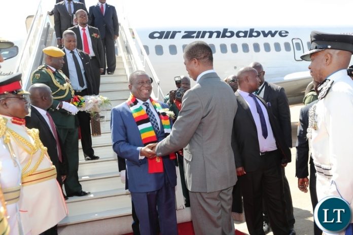 Zimbabwe's President Emmerson Dambudzo Mnangagwa arrives in the country to grace Zambia's 54th independence anniversary. Here he is seen walking on the red carpet at Kenneth Kaunda International Airport on Tuesday, 23rd October, 2018, PICTURE BY EDDIE MWANALEZA/STATE HOUSE President Edgar Chagwa Lungu welcomes Zimbabwe's President Emmerson Dambudzo Mnangagwa at Kenneth Kaunda International Airport on Tuesday, 23rd October, 2018, PICTURE BY EDDIE MWANALEZA/STATE HOUSE