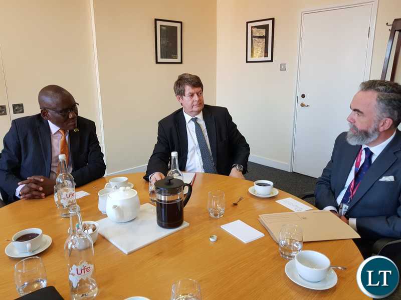 Hon. Banda, Sir Dixon and John Jackson during a meeting at the Natural History Museum in London.