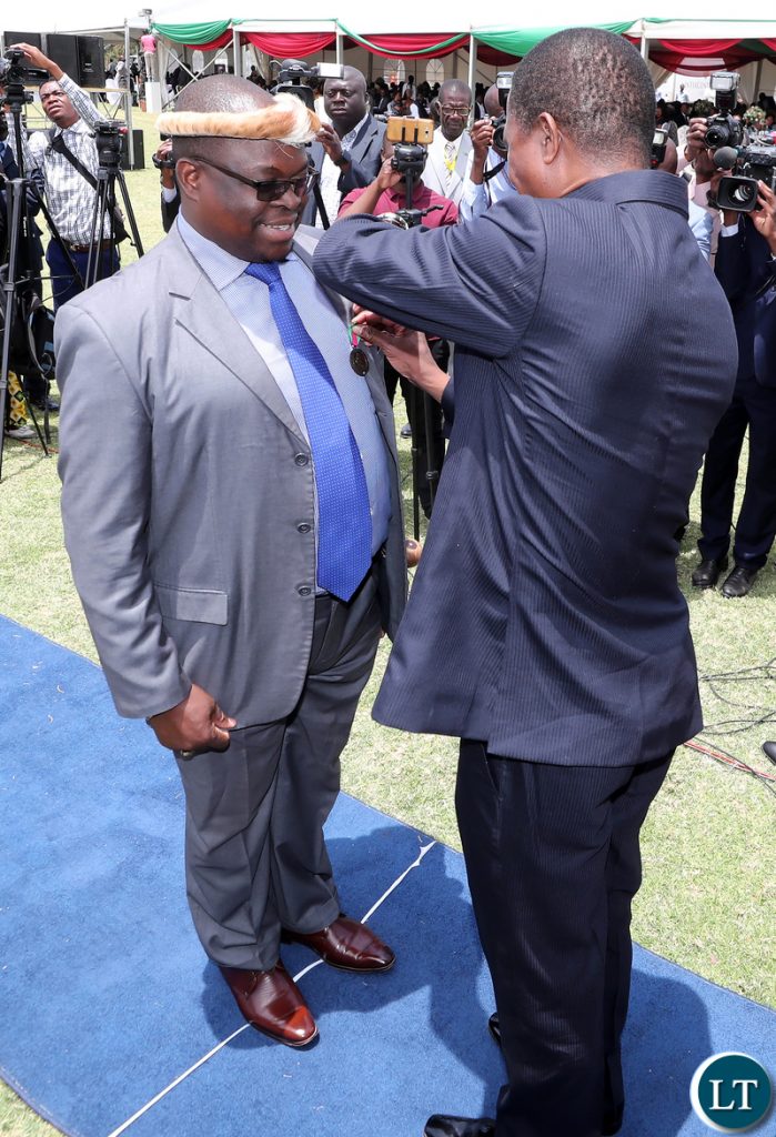 President Edgar Lungu bestows The President Insignia of Honour on Jere Ntembeni Madzimawe (Chief Madzimawe) on the occasion to mark Zambia's 54th Independence anniversary at State House on Wednesday, 24th October, 2018. Picture by Eddie Mwanaleza/State House