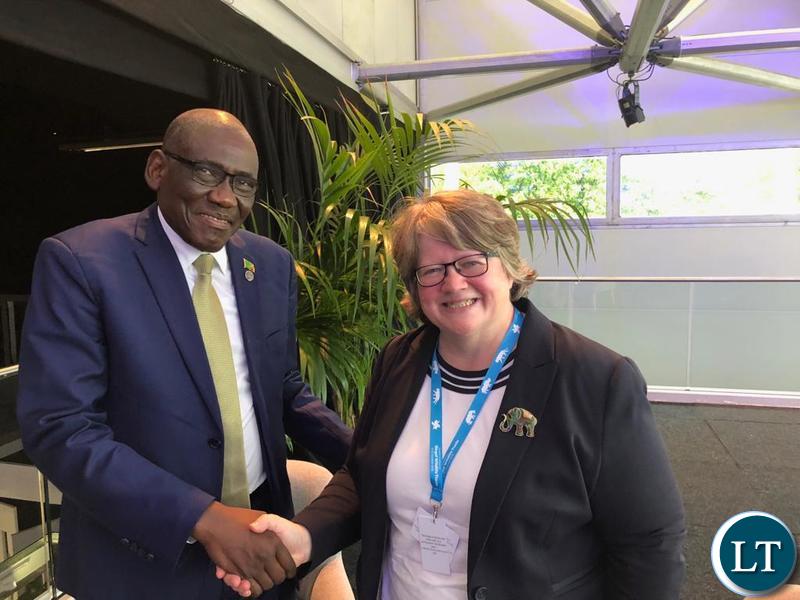 Tourism Minister Charles Banda with UK Parliamentary Under Secretary of State for the Environment Therese Coffey during the London Conference on Illegal Wildlife Trade.