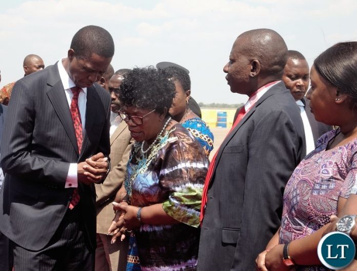President Edgar Lungu talking to Higher Education Minister Professor Nkandu Luo at Kenneth Kaunda International Airport before departure for Uganda.Picture by SUNDAY BWALYA/ZANIS President Edgar Lungu talking to Higher Education Minister Professor Nkandu Luo at Kenneth Kaunda International Airport before departure for Uganda.Picture by SUNDAY BWALYA/ZANIS