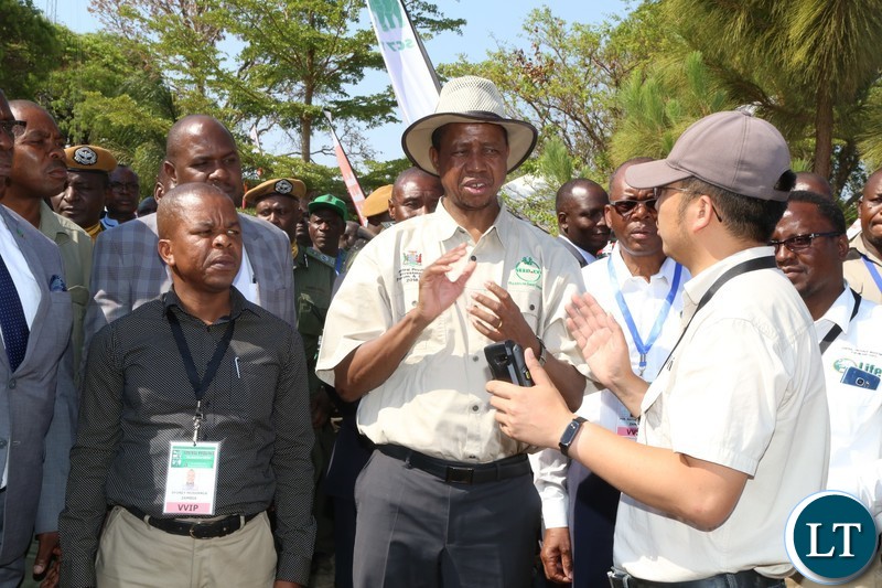 President Edgar Lungu talks to Sunagri Techno-Farming Director Mr Fraser during the tour of stands before the official opening of the Central Province Investment Forum and Expo in Kapiri District