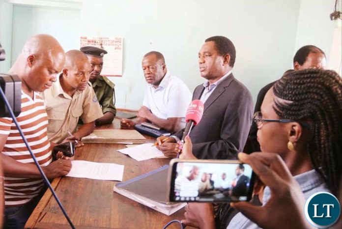 HH accompanied by his lawyer Jackie Mwiimbu making a formal complaint at Woodlands Police Station against Chilufya Tayali.