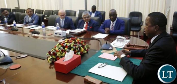 President Edgar Chagwa Lungu (right) interacts with Investors from Luapula Province on Investments and Developments programs in that region during a meeting at State House in Lusaka on Wednesday,October 17,2018. The Investors were in the company of Luapula Province Minister Nickson Chilangwa comprised of Sunbird Bio Energy Limited,MMRP Mining,Mansa Sugar,Kawambwa Sugar Project,GED AFRICA LIMITED. PICTURE BY SALIM HENRY/STATE HOUSE ©2018