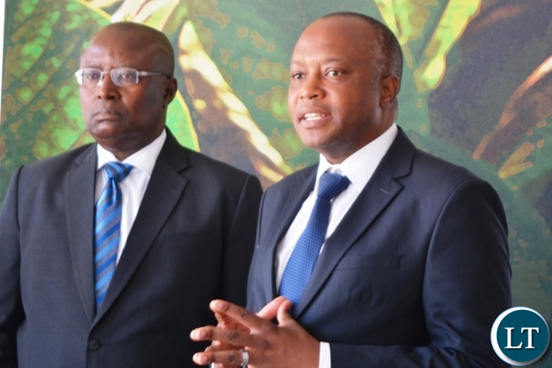 Director of British American Tobacco,Godfrey Machanzi(r) addressing the media during the tour of cigarette manufacturing factory company which has invested over $ 25 million in construction at the Multi Facility Economic Zone in Lusaka.Looking on is Head of operations,Jerry Chivambo.