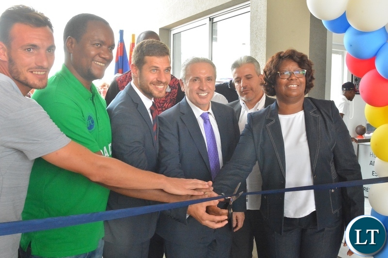 Minister in the vice -President's Office,Sylvia Chalikosa and Lusaka mayor, Miles Sampa cut the ribbon during the official launch of Barcelona soccer academy and futsal and sports complex in Lusaka.