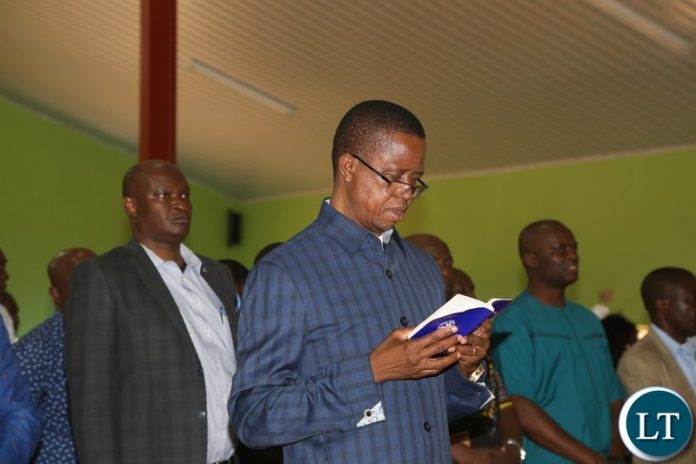 President Edgar Lungu singing during a church service at UCZ Lilayi