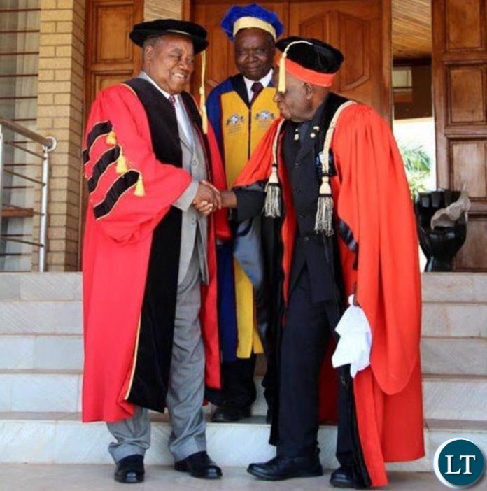 Pix: Dr Kaunda shakes hands as he congrats Mr Banda on his appointment
