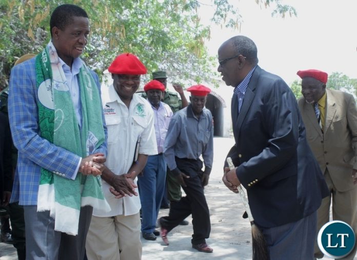 President Edgar Lungu (l) bids farewell to the Litunga Lubosi Imwiko II (r) after paying courtesy call on him at the Royal Palace in Limulunga District Western Province