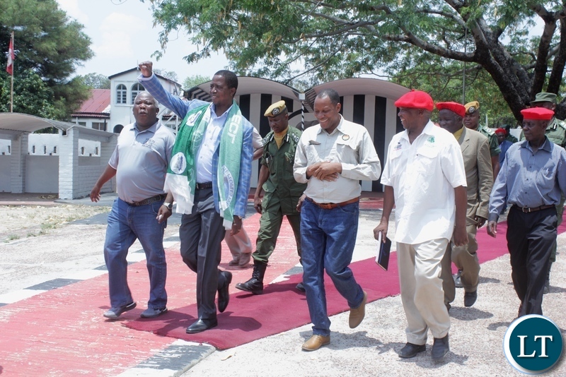President Edgar Lungu (c) raises the PF symbol to the people of Limulunga District after paying courtesy call on the Litunga, heading to drum up support for the PF ahead of the Mangango parliamentary by-election to be held on November 20, 2018.
