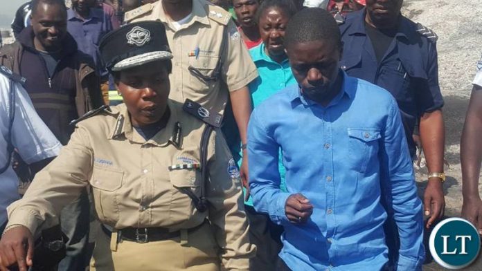 FILE: Copperbelt Police Commissioner Charity Katanga with Copperbelt Province Patriotic Front (PF), Youth Chairman Nathan Chanda FILE: Copperbelt Police Commissioner Charity Katanga with Copperbelt Province Patriotic Front (PF), Youth Chairman Nathan Chanda